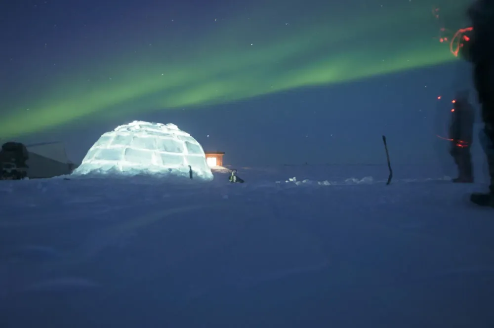 igloo and northern lights
